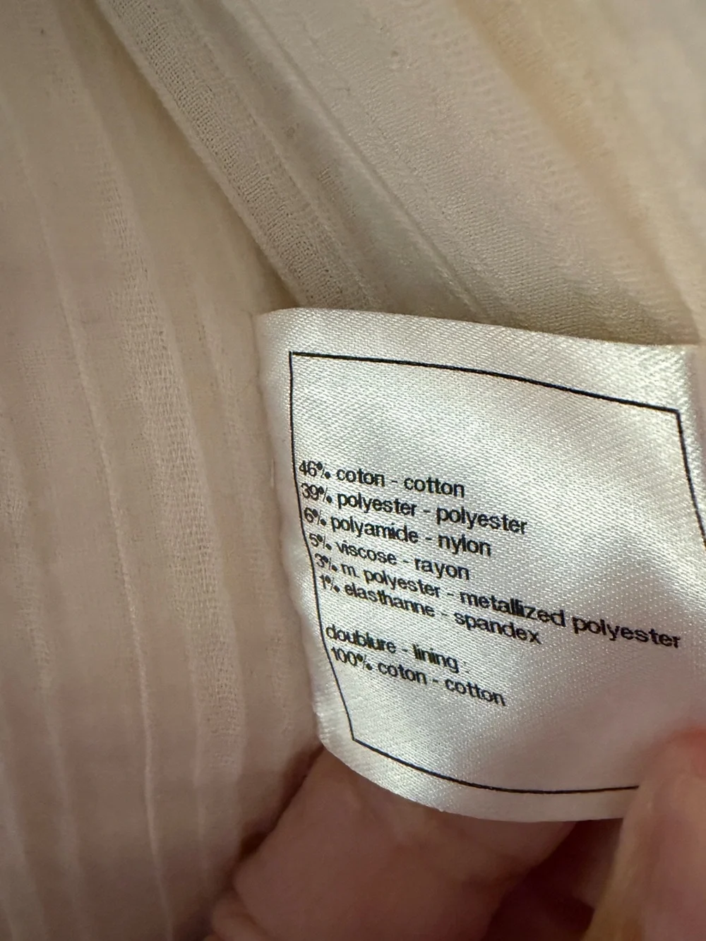CHANEL Cream Bouclé Zip Jacket with Four Pockets